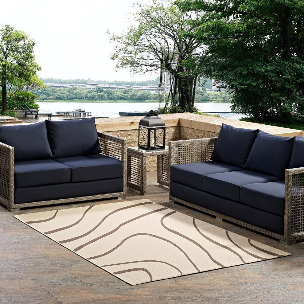 Light and dark beige swirl abstract indoor and outdoor area rug by Modway