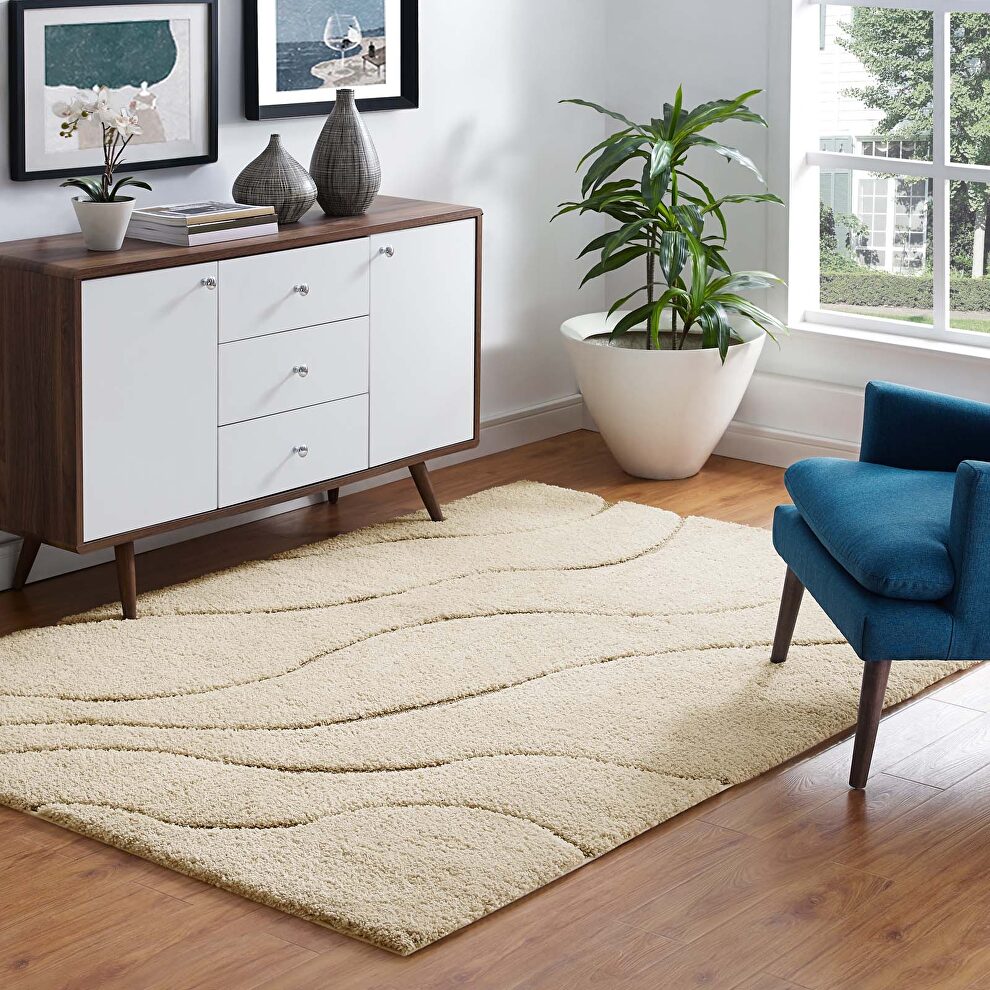 Abound abstract swirl shag area rug in creame and beige by Modway