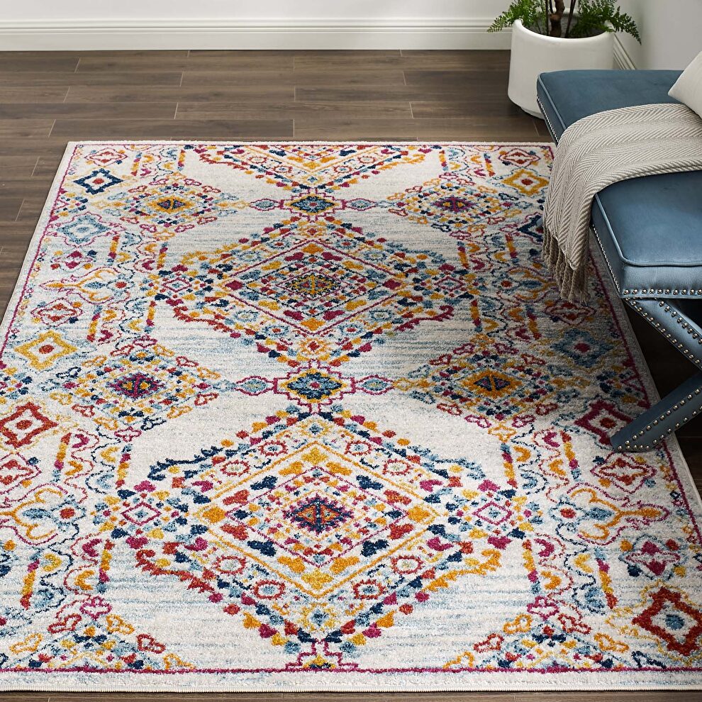 Distressed floral lattice area rug in ivory, blue, orange, yellow, red by Modway