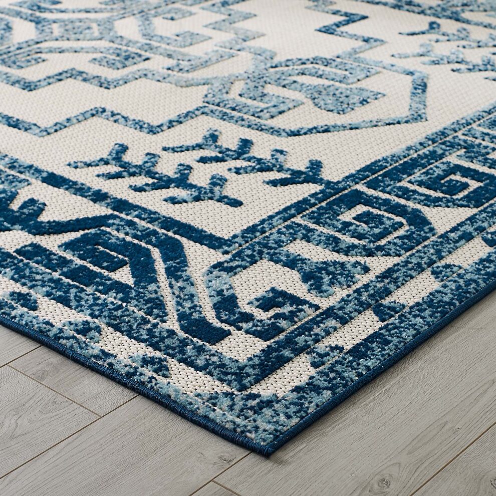 Ivory and blue distressed geometric southwestern aztec indoor/outdoor area rug by Modway
