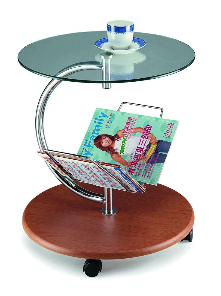 Modern small round glass top magazine table by New Spec