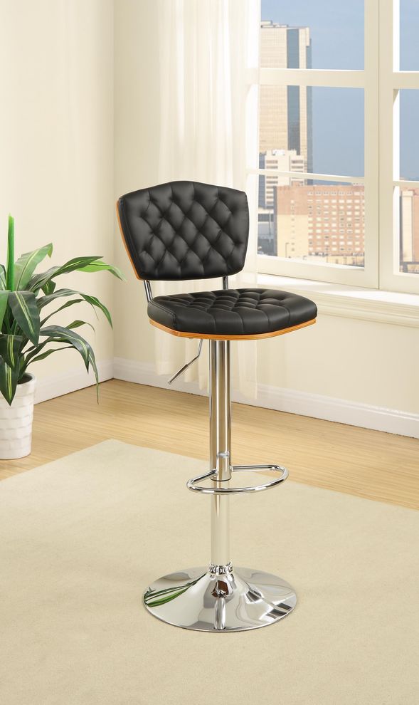 Black swiver bar stool with tufted seat/back by Poundex