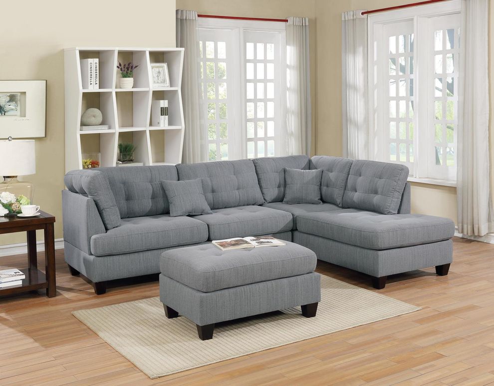 Gray linen-like fabric reversible sectional + ottoman set by Poundex
