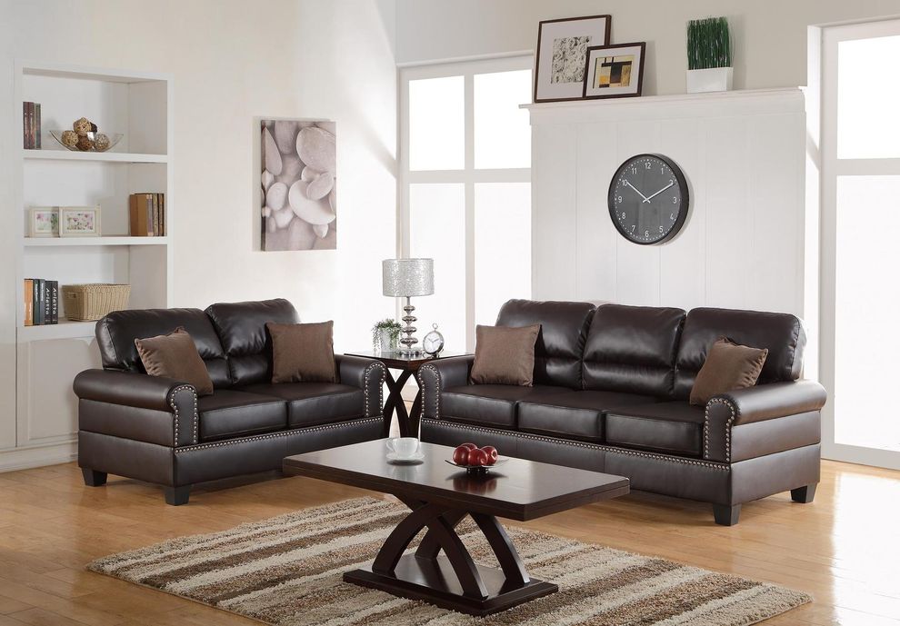 Faux leather black espresso and loveseat set by Poundex