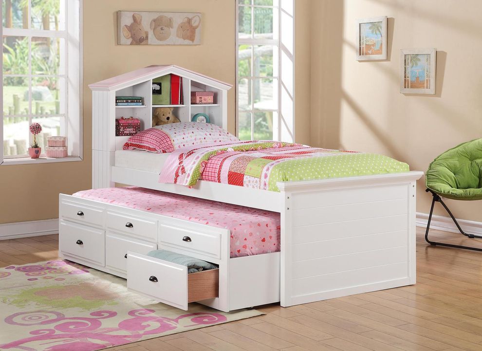 White twin bed with trundle and storage shelves by Poundex