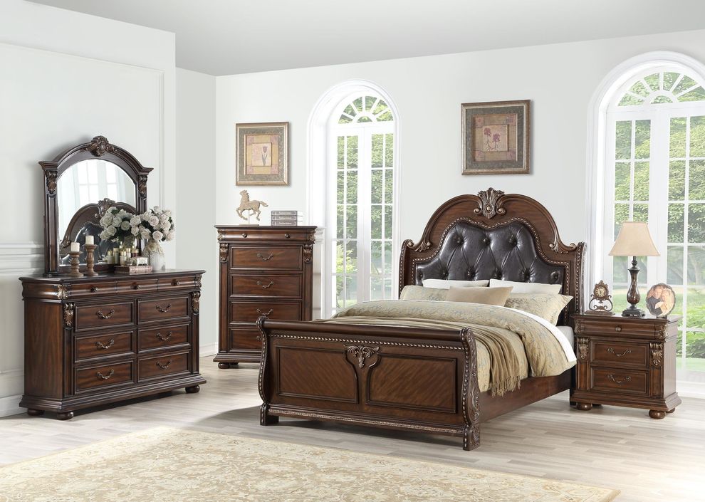 Carved vintage king bed in traditional style by Poundex
