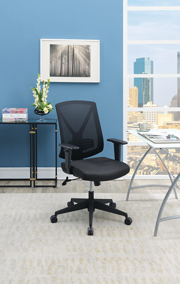 Black mesh and fabric office chair by Poundex