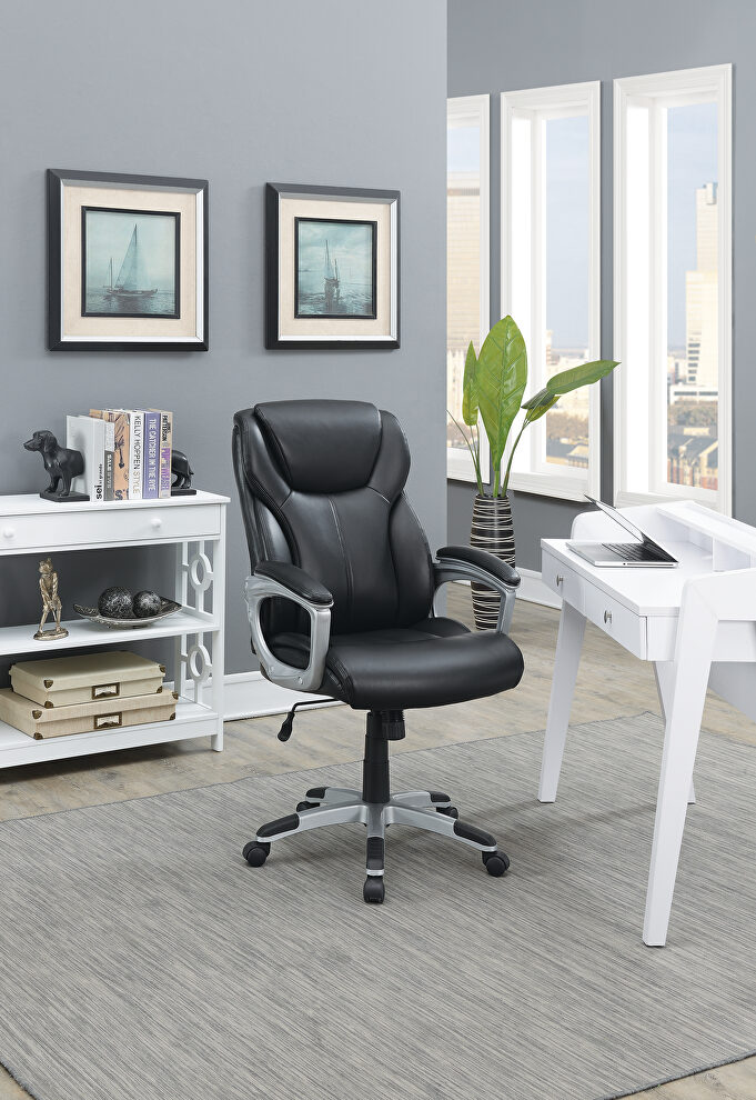 Black bouned leather office chair by Poundex