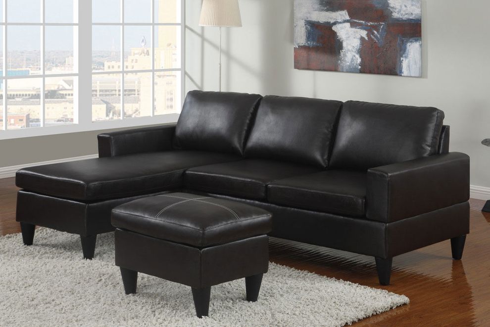Small black sectional with ottoman set by Poundex