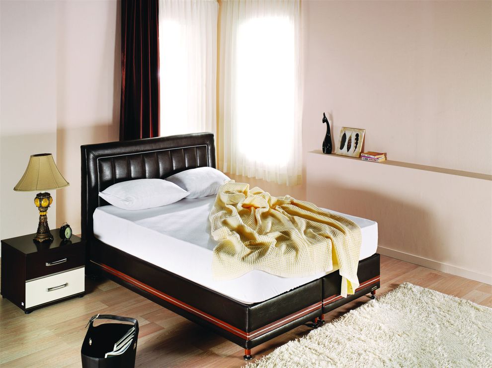 Modern storage brown leather designer bed by Istikbal