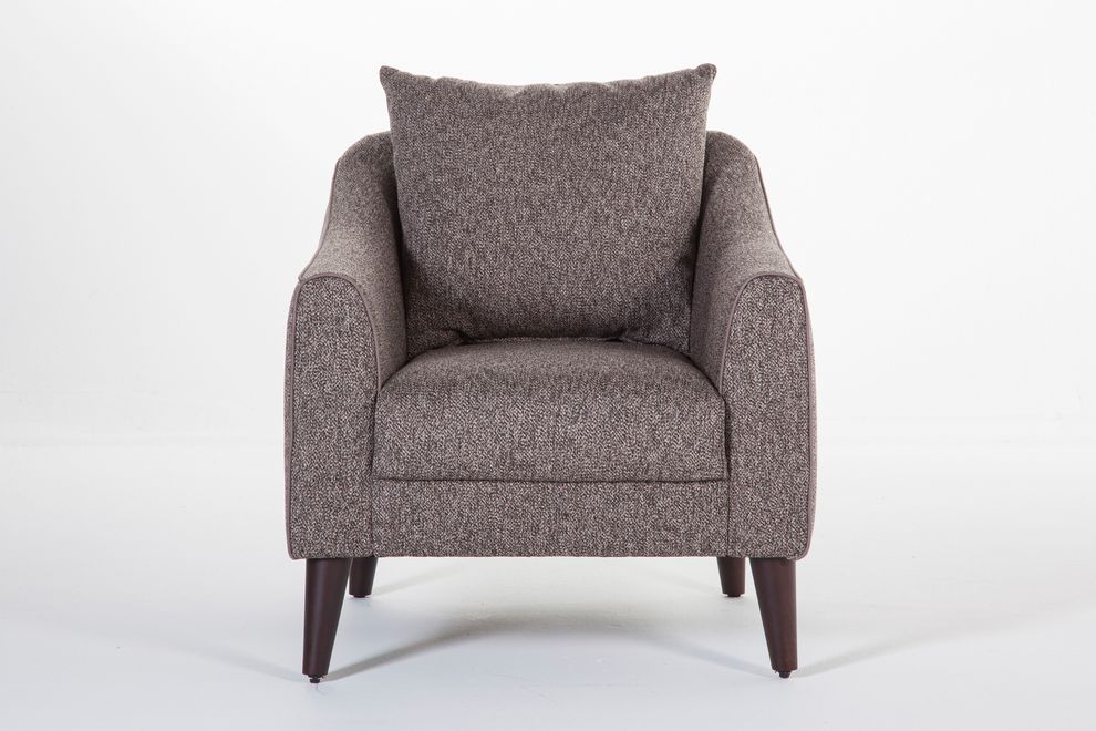 Brown accent chair by Istikbal