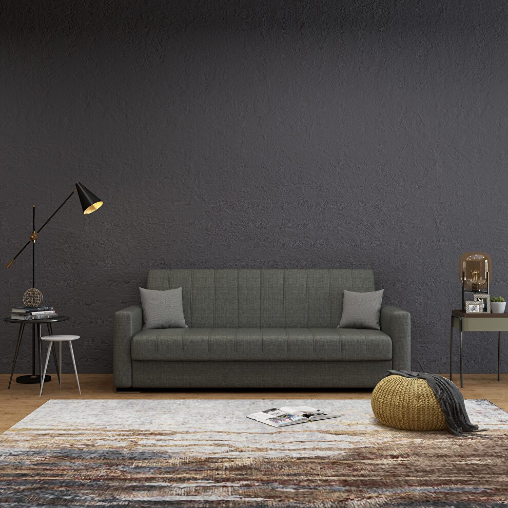 Charcoal gray fabric sleeper / storage sofa by Istikbal