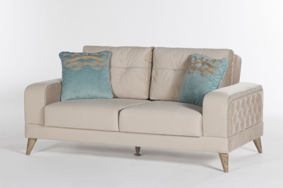 Cozy comfortable beige fabric sleeper loveseat by Istikbal