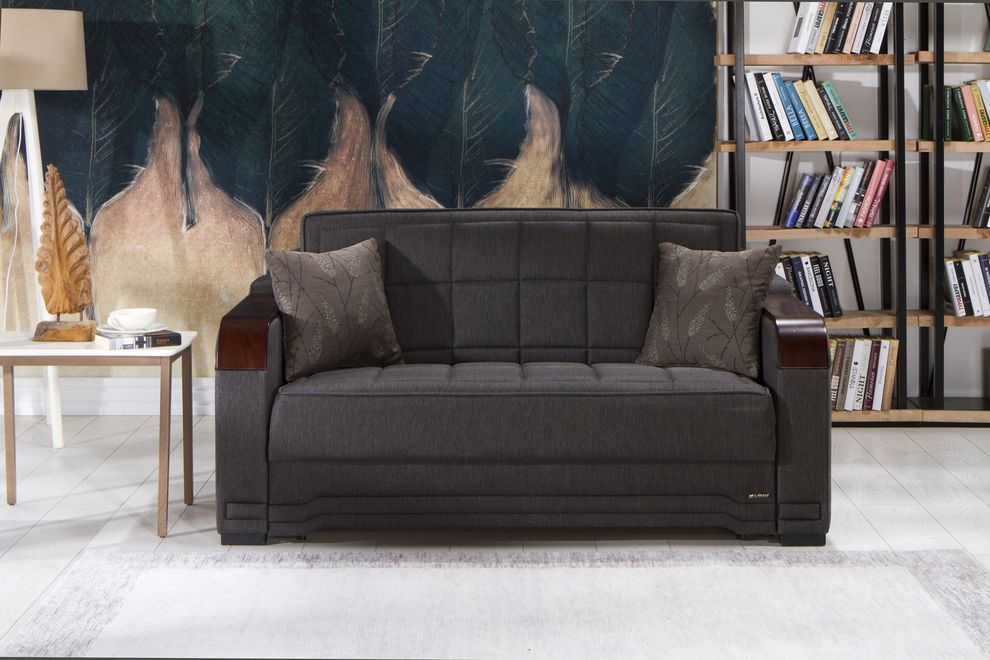 Loveseat pull-out sofa bed in dark gray by Istikbal