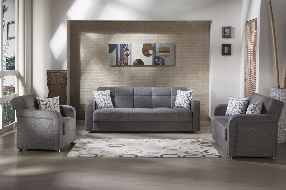 Gray fabric sofa w/ storage and bed by Istikbal