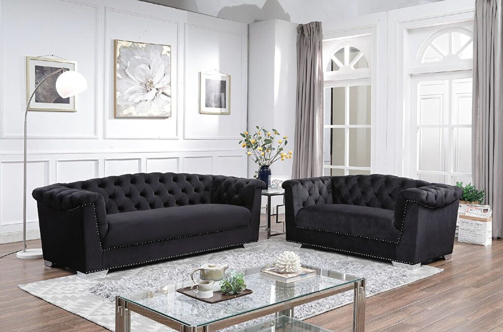 Black arched back tufted velvet sofa and loveseat set by Velvet Imports