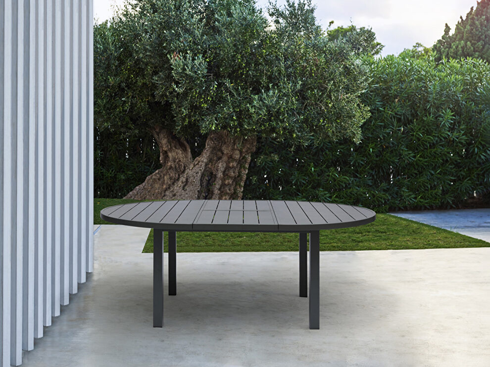 Indoor/outdoor extendable oval dining table in gray by Whiteline 
