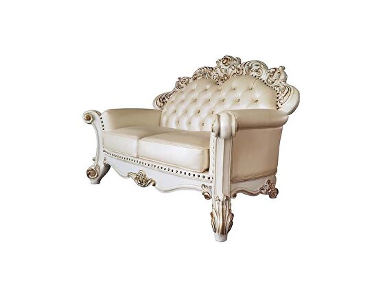Champagne pu & antique pearl finsih button tufted loveseat