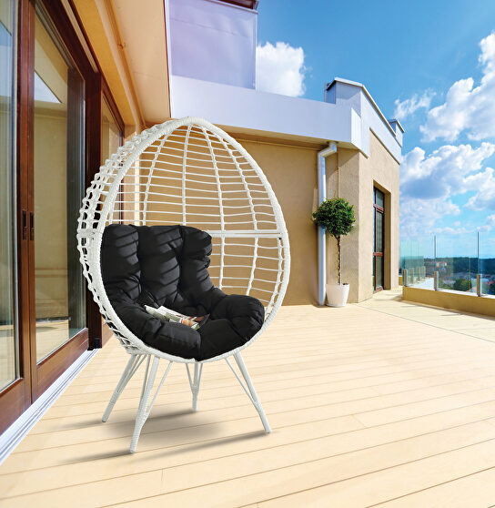 Black fabric & white wicker patio lounge chair