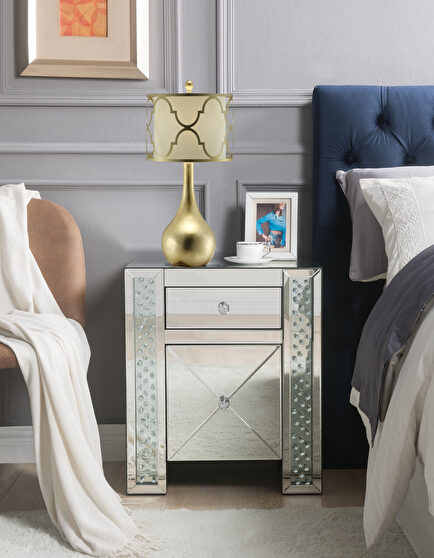 Mirrored accent table in glam style