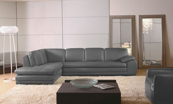 Left-facing gray leather low-profile modern sectional