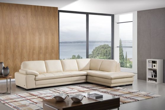 Right-facing beige leather low-profile contemporary sectional