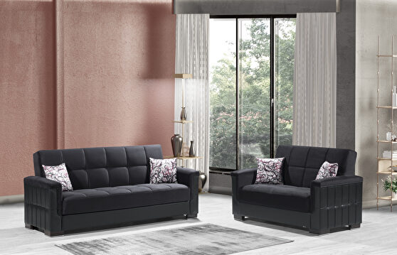 Two-toned black on black fabric / leather sofa sleeper