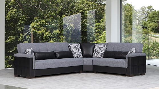 Fully reversible gray fabric / black leather sectional