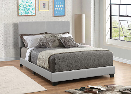 Gray faux leather upholstered queen bed