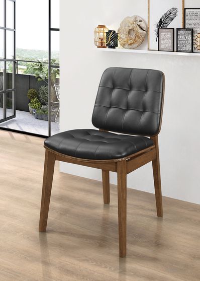 Dining chair in natural walnut / black leatherette