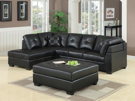 Black leather sectional sofa in casual style