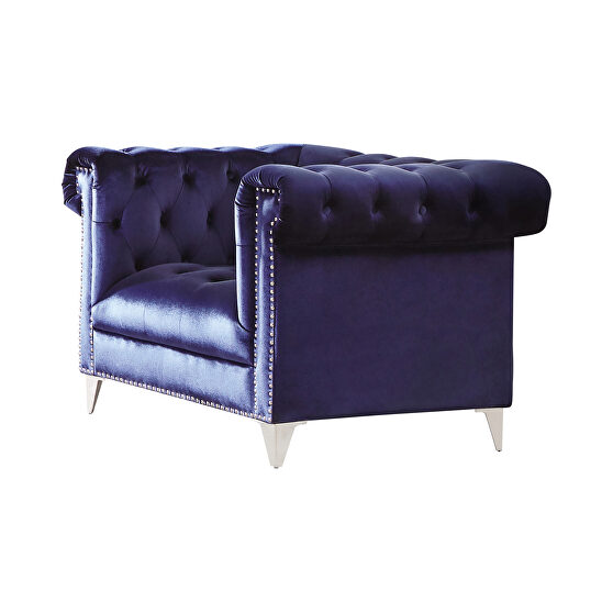 Button tufted blue velvet chair