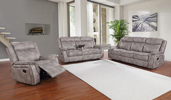 Motion sofa upholstered in taupe performance-grade coated microfiber