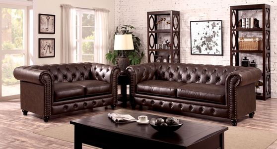 Nailhead trim / button tufted brown leather sofa