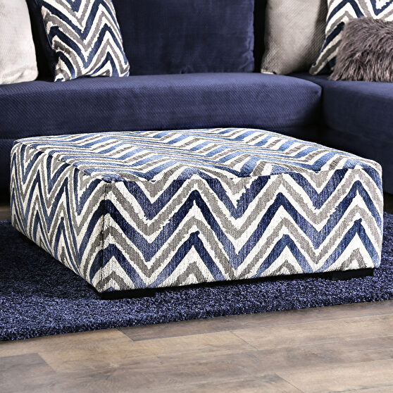 Large-print 'z' pattern accents contrasting ottoman