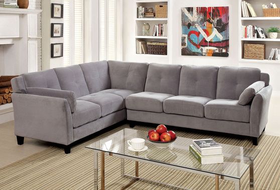 Casually styled sectional sofa in gray fabric