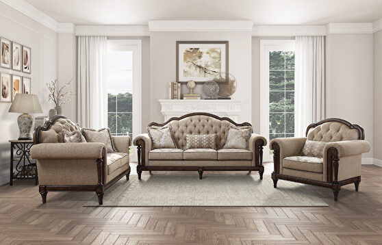 Neutral hued brown fabric sofa with 3 pillows
