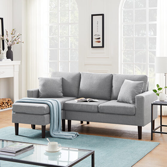 Light gray fabric reversible sectional sofa left hand facing
