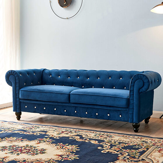 Blue velvet couch, chesterfield sofa