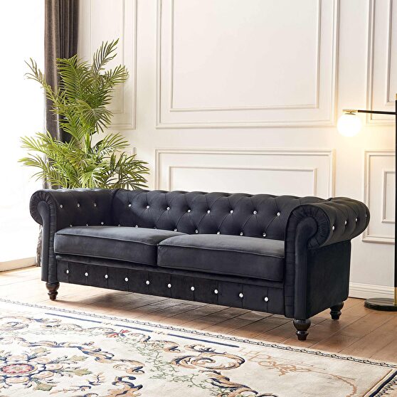 Black velvet couch, chesterfield sofa