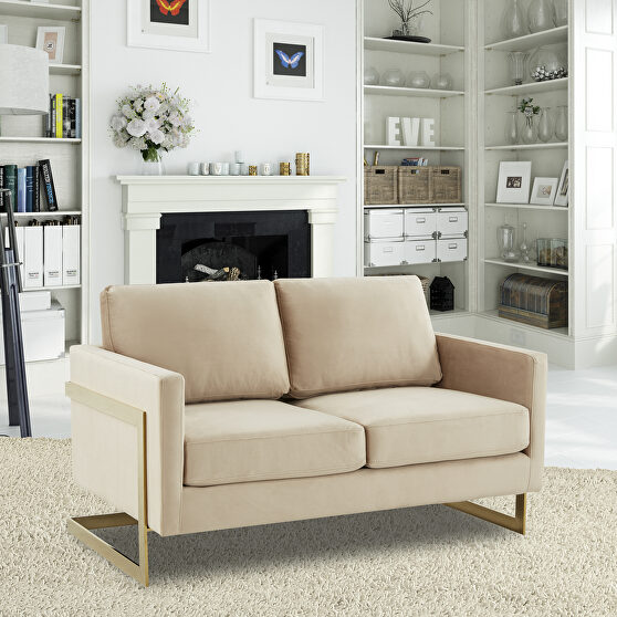 Modern mid-century upholstered beige velvet loveseat with gold frame