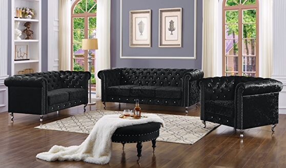 Black velour fabric tufted sofa in glam style