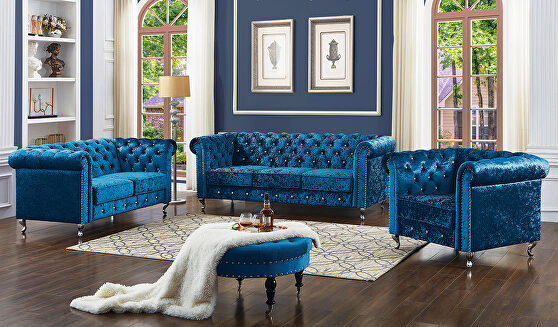 Blue velour fabric tufted sofa in glam style