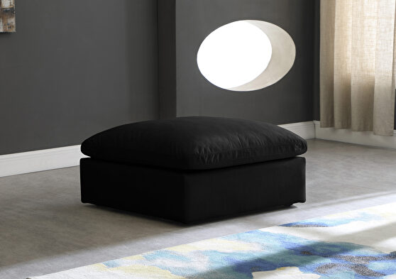 Modular black velvet ottoman
