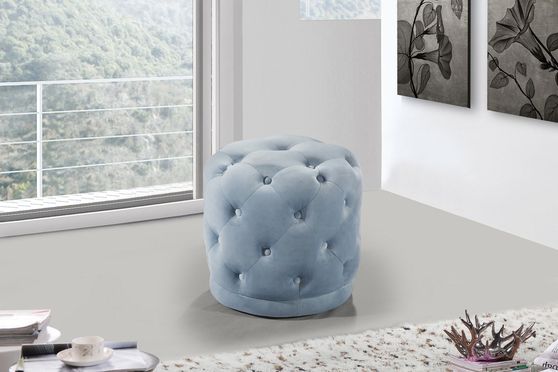 Blue velvet tufted round ottoman