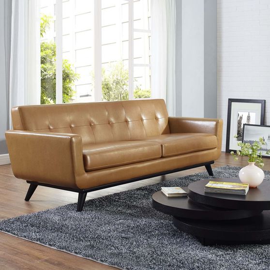Tan caramel leather retro style sofa