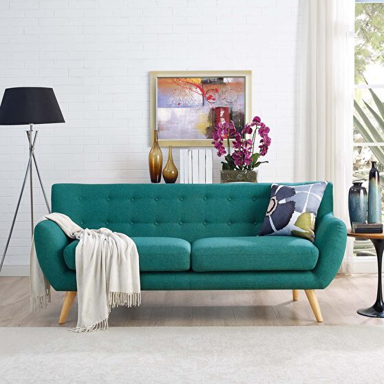 Mid-century style tufted retro couch in teal