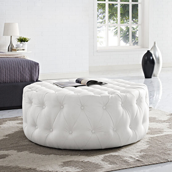 Upholstered vinyl ottoman in white