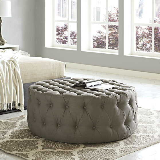 Upholstered fabric ottoman in granite