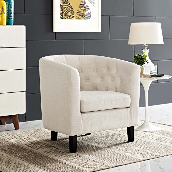 Upholstered fabric armchair in beige
